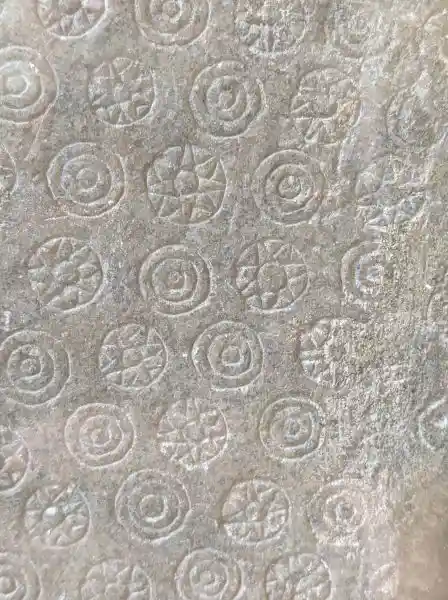 Palace relief, alabaster, Nineveh, solar disc on garment, located at the Pergamon museum.